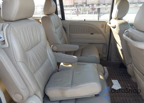 2010 Honda Odyssey Ex-L z USA, uszkodzony, nr VIN 5FNRL3H75AB053149